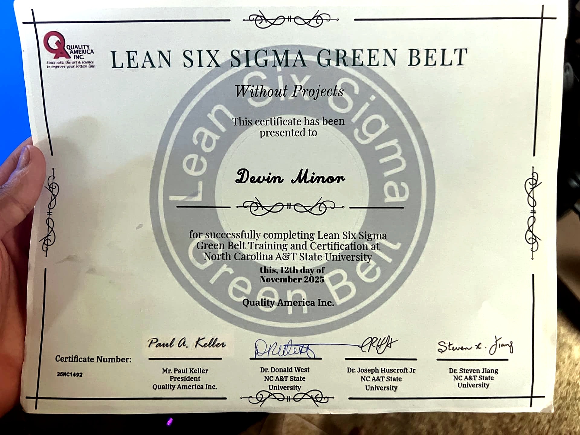 Lean Six Sigma Green Belt certificate presented to Devin Minor, Quality America Inc., November 12, 2025